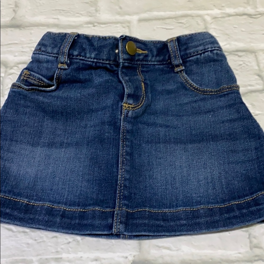 Old navy blue Jean skirt. 18 to 24 months